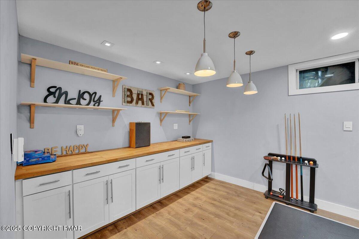 3118 Cherry Ridge Road Bushkill, PA 18324 - Photo 27 of 51 a kitchen with white cabinets and sink
