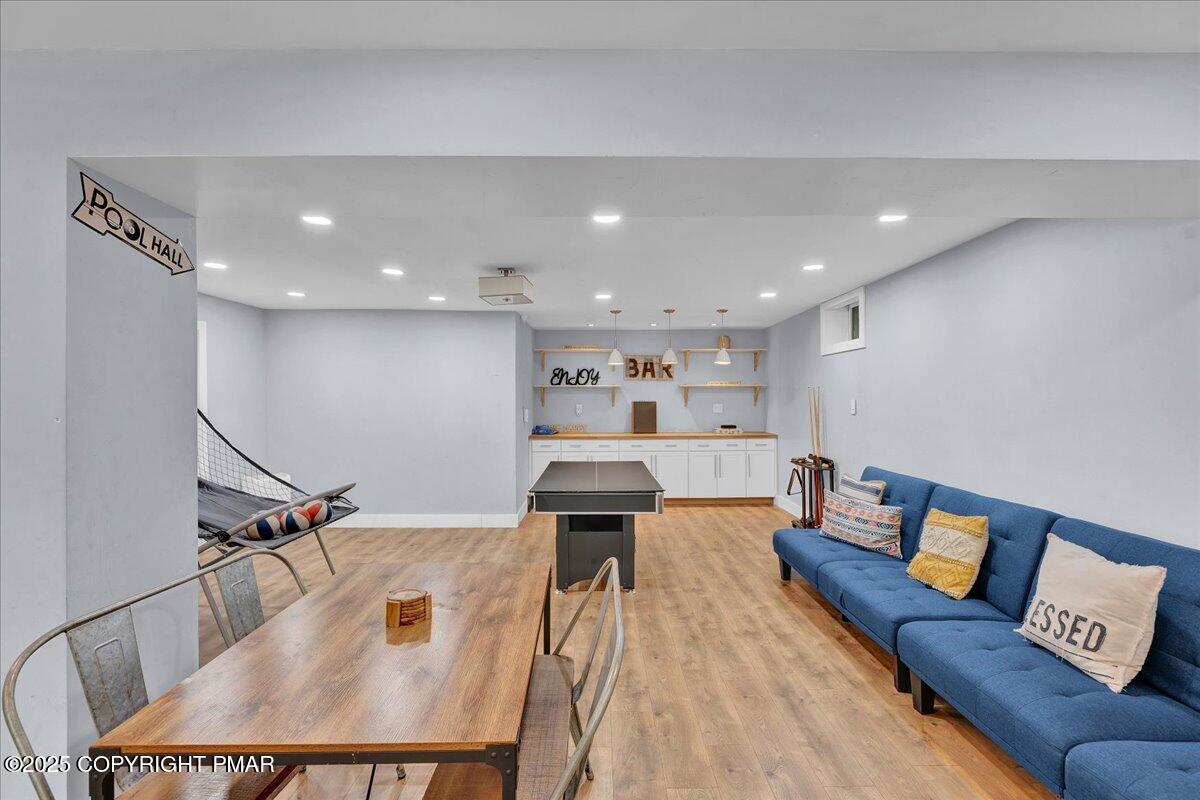 3118 Cherry Ridge Road Bushkill, PA 18324 - Photo 28 of 51 a living room with furniture and kitchen view