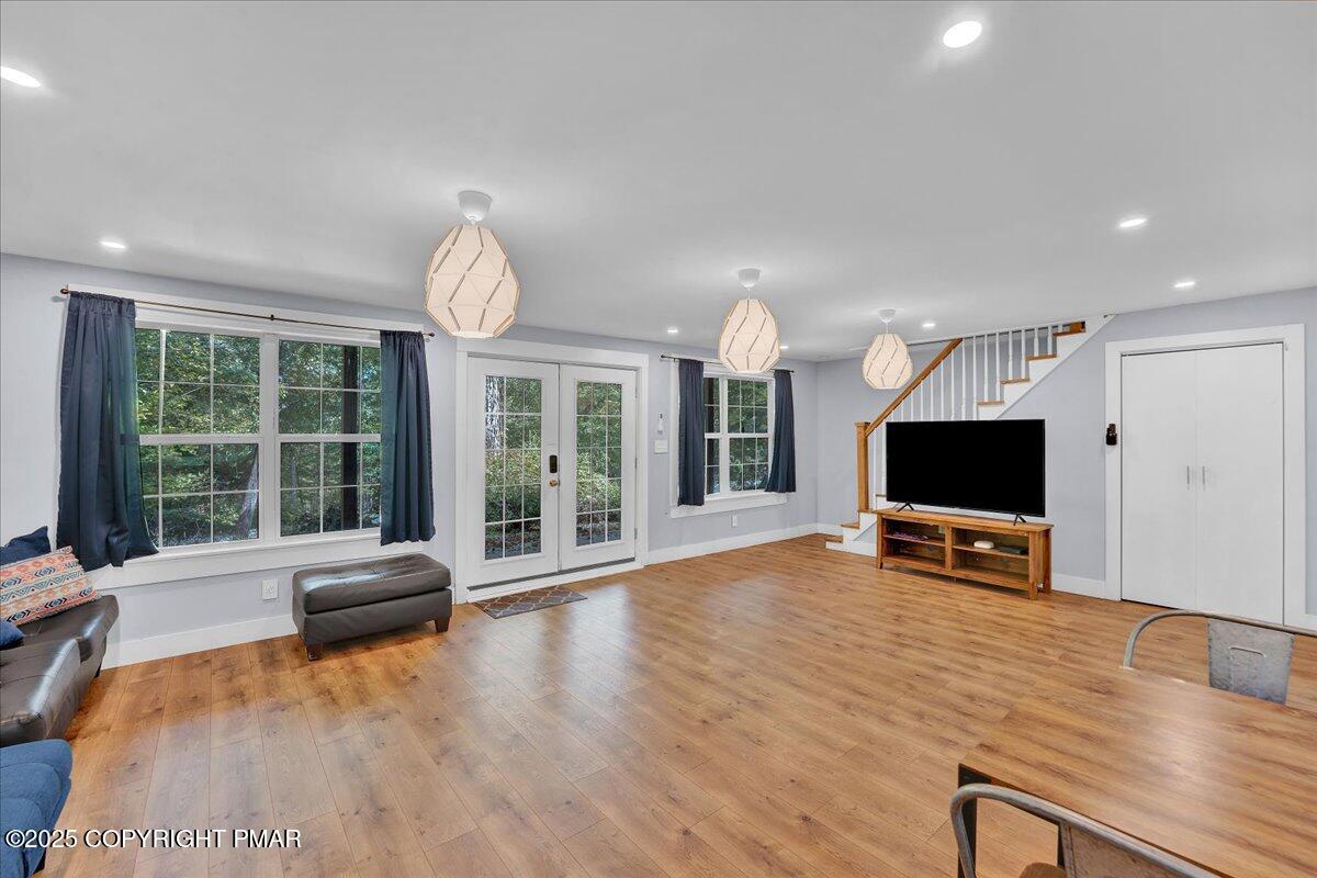 3118 Cherry Ridge Road Bushkill, PA 18324 - Photo 30 of 51 a living room with furniture flat screen tv and a large window