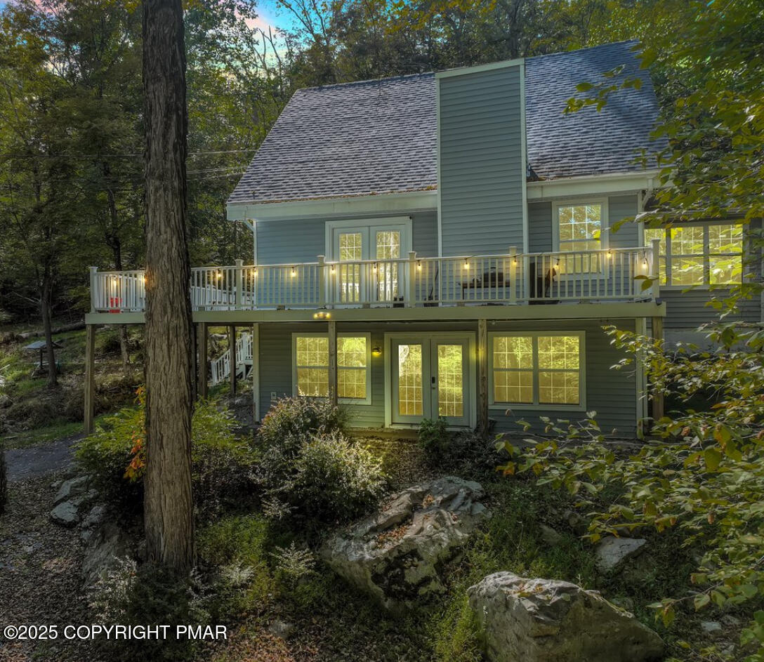 3118 Cherry Ridge Road Bushkill, PA 18324 - Photo 48 of 51 a front view of a house with garden