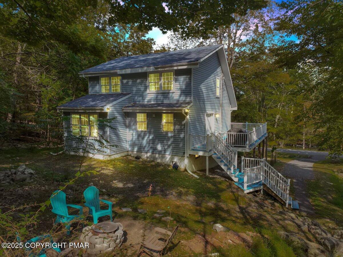 3118 Cherry Ridge Road Bushkill, PA 18324 - Photo 49 of 51 a front view of a house with garden