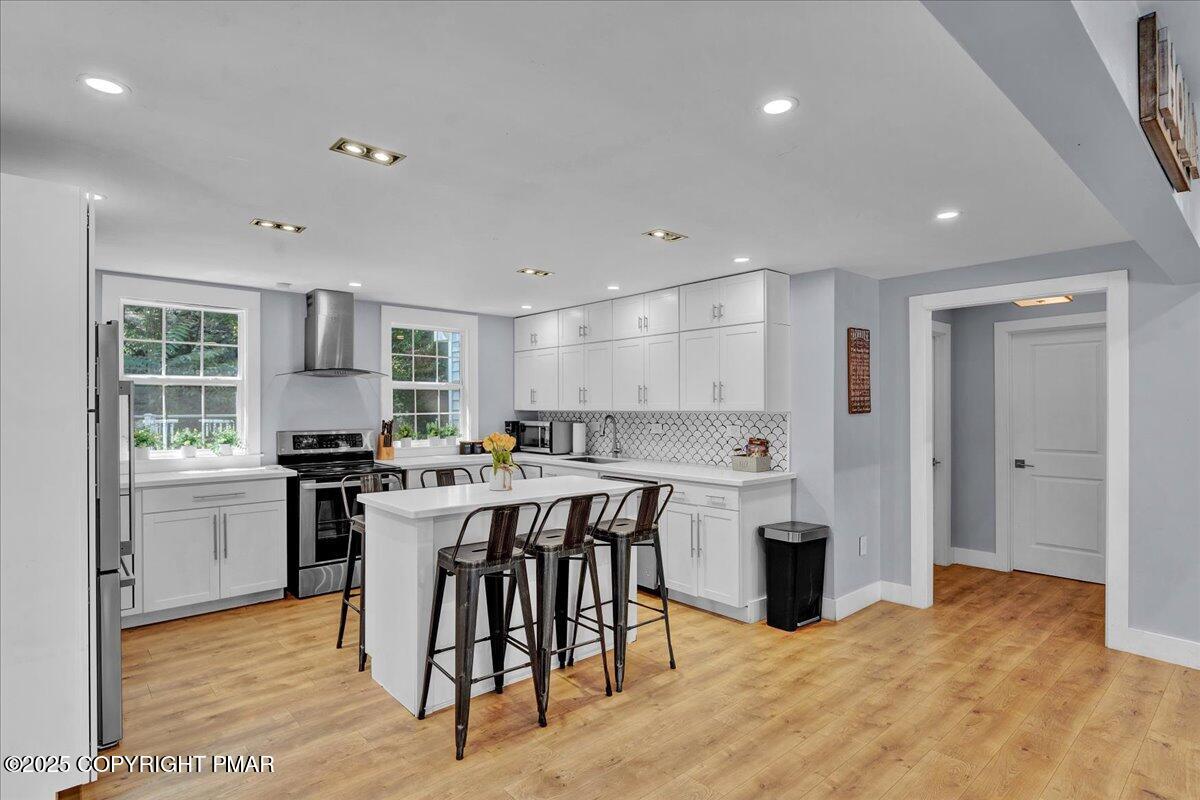 3118 Cherry Ridge Road Bushkill, PA 18324 - Photo 6 of 51 a kitchen with a table and chairs in it