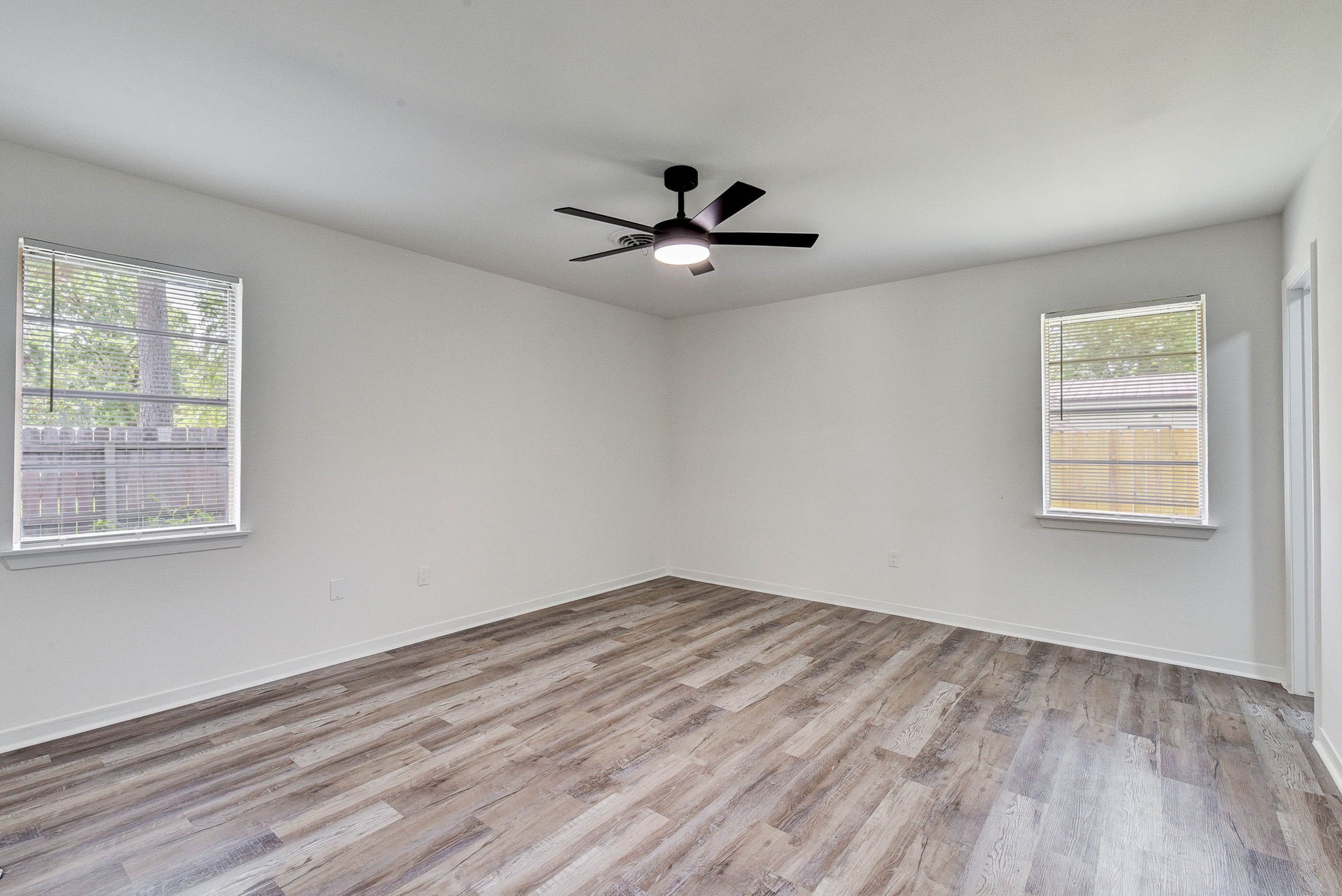 1703 North Roberson Street Conroe, TX 77301 - Photo 24 of 44 Primary bedroom
