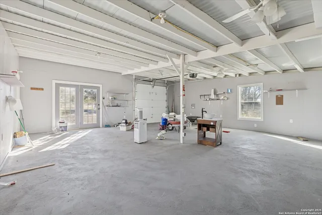 a view of a livingroom with fireplace and furniture
