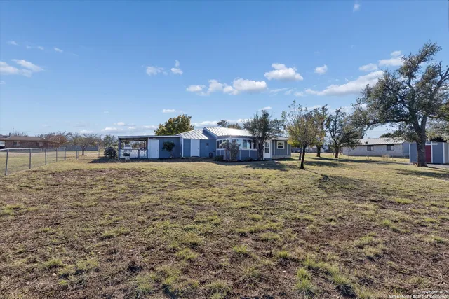 a view of a lake with a building in the background