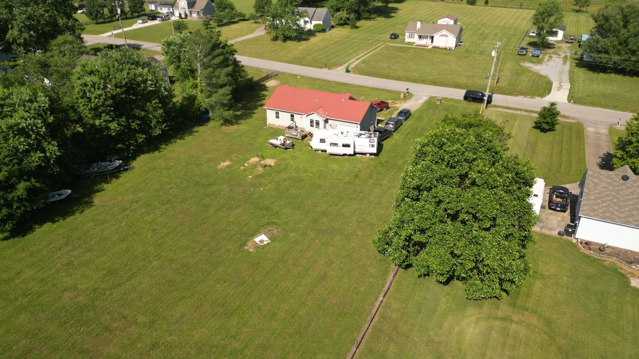 4009 Sawmill Road Woodlawn, TN 37191 - Photo 5 of 6 an aerial view of a residential houses
