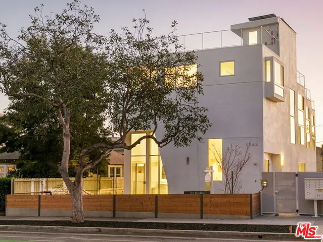 a view of a building with trees