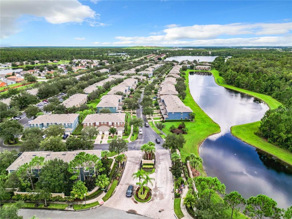 3309 Wilshire Way Road, Unit 3 Orlando, FL 32829 - Photo 41 of 43 an aerial view of residential houses with outdoor space and street view