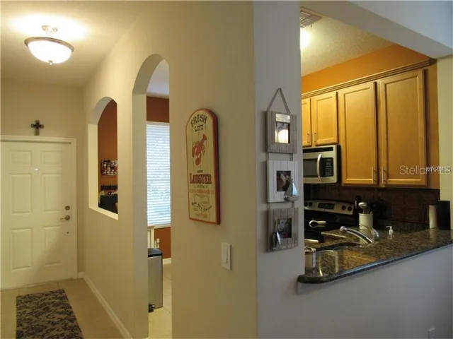 a bathroom with a sink a mirror and a shower