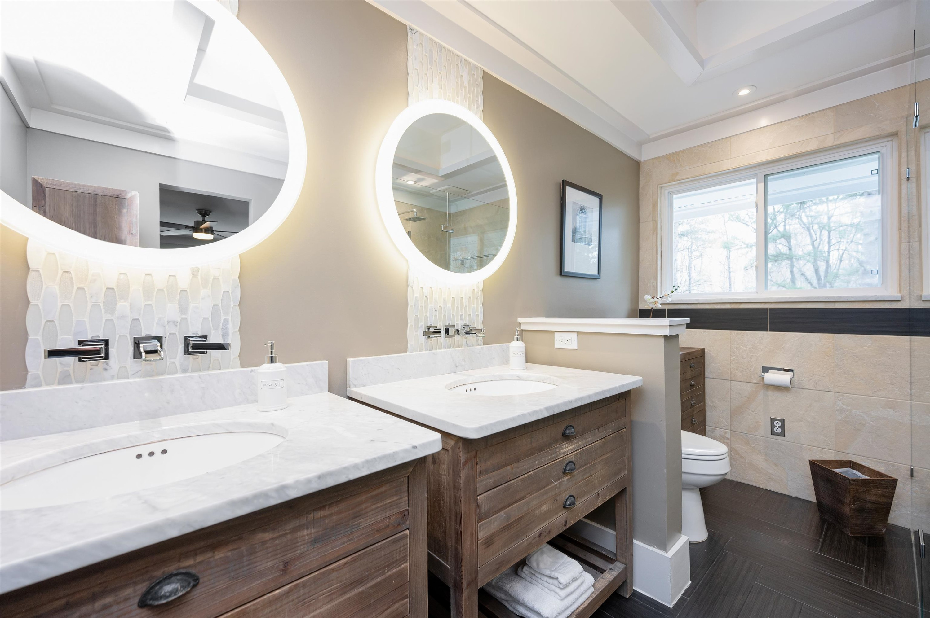 4907 Rembert Drive Raleigh, NC 27612 - Photo 22 of 52 Homeowner's retreat features a true sitting room, walk-in closet, and remodeled bath with dual vanities and swanky walk-in shower Homeowner's Retreat