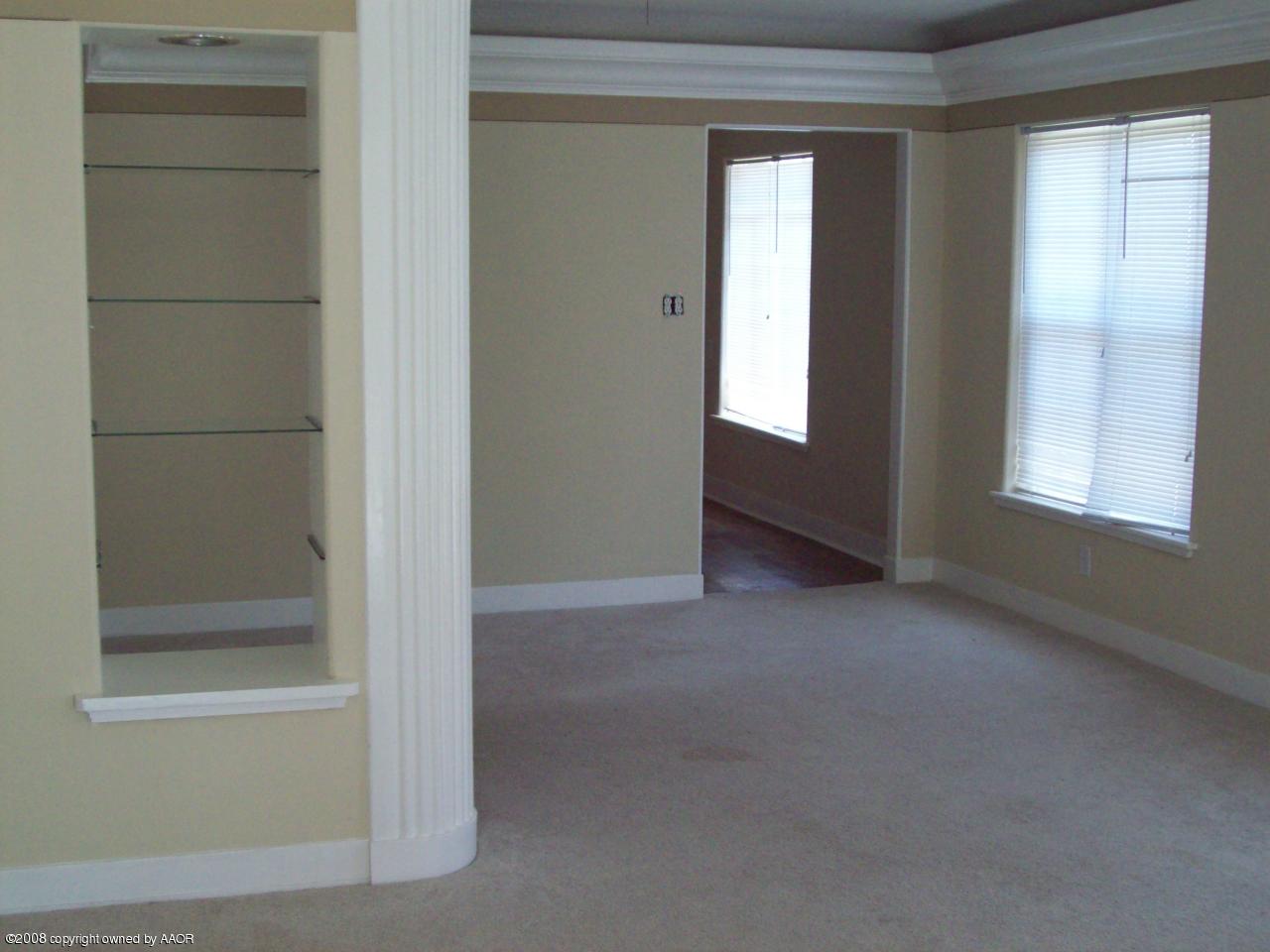 3711 South Polk Street Amarillo, TX 79110 - Photo 8 of 20 a view of empty room with windows