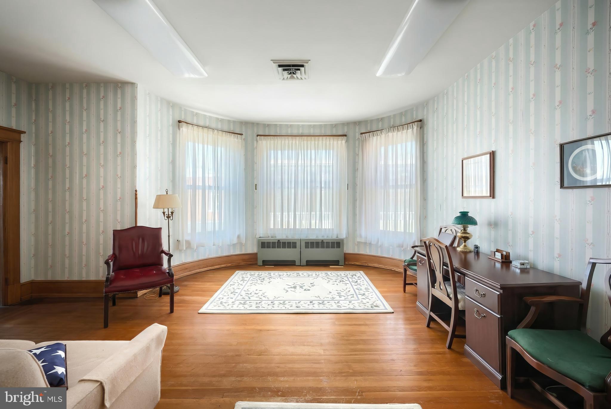 119 Baltimore Street Hanover, PA 17331 - Photo 19 of 26 a living room with furniture and a rug