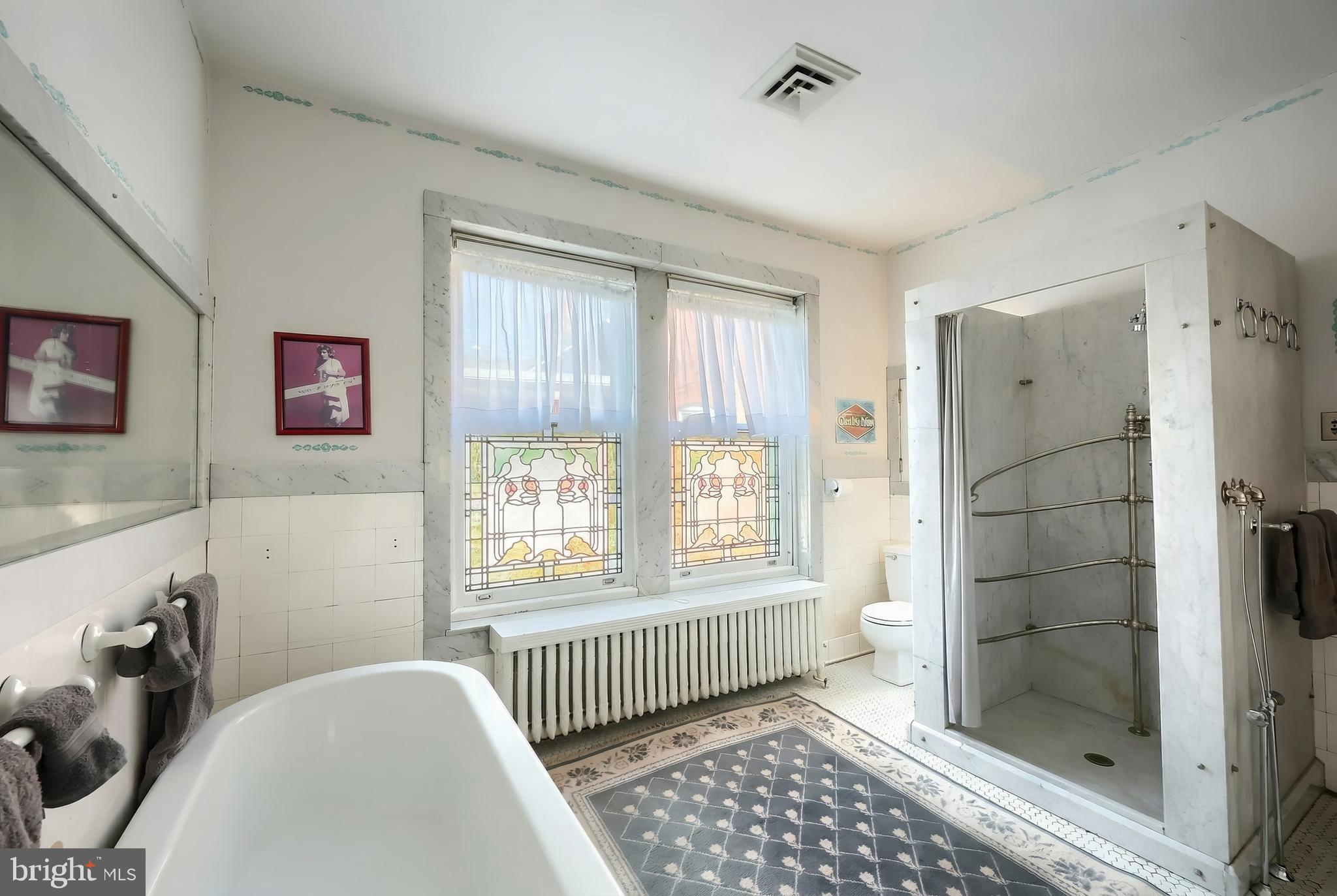 119 Baltimore Street Hanover, PA 17331 - Photo 20 of 26 a bedroom with a bed and a window