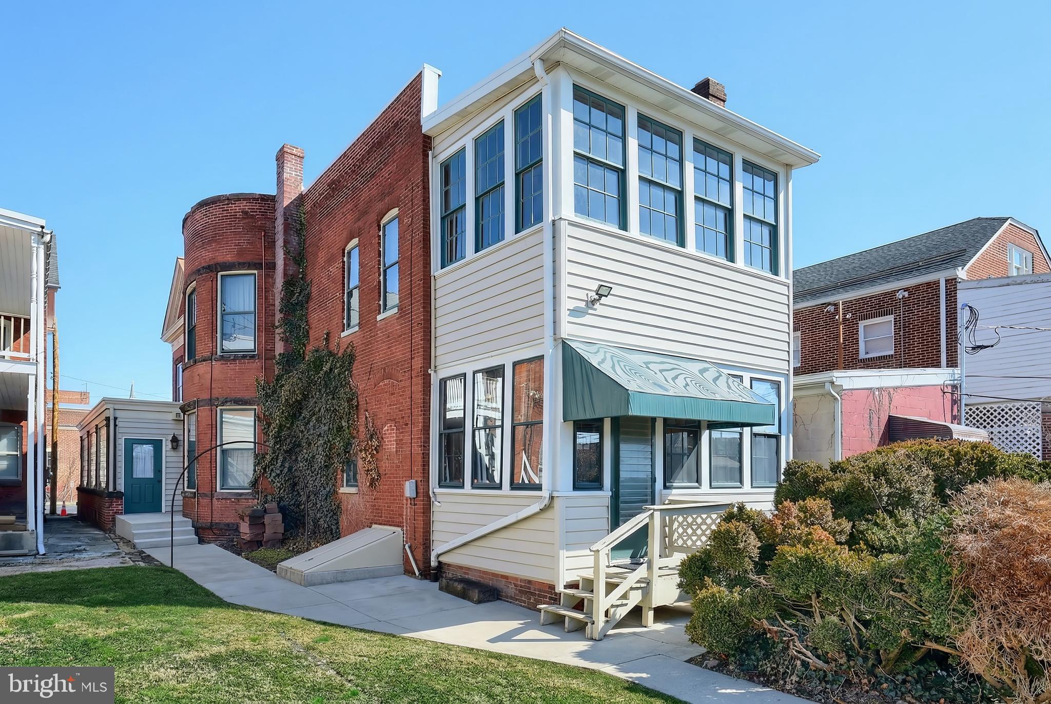 119 Baltimore Street Hanover, PA 17331 - Photo 2 of 26 a front view of a house with a yard