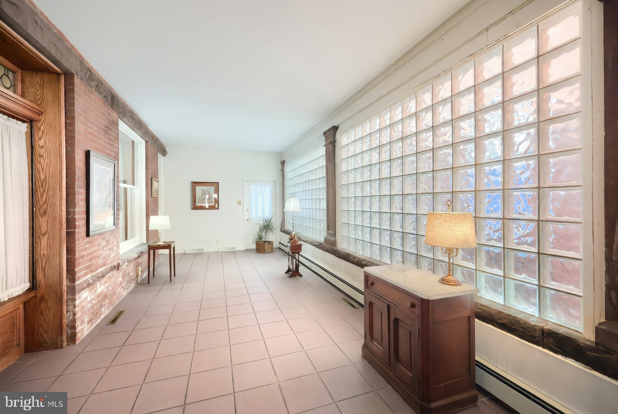 119 Baltimore Street Hanover, PA 17331 - Photo 7 of 26 a spacious bathroom with a tub and a large window