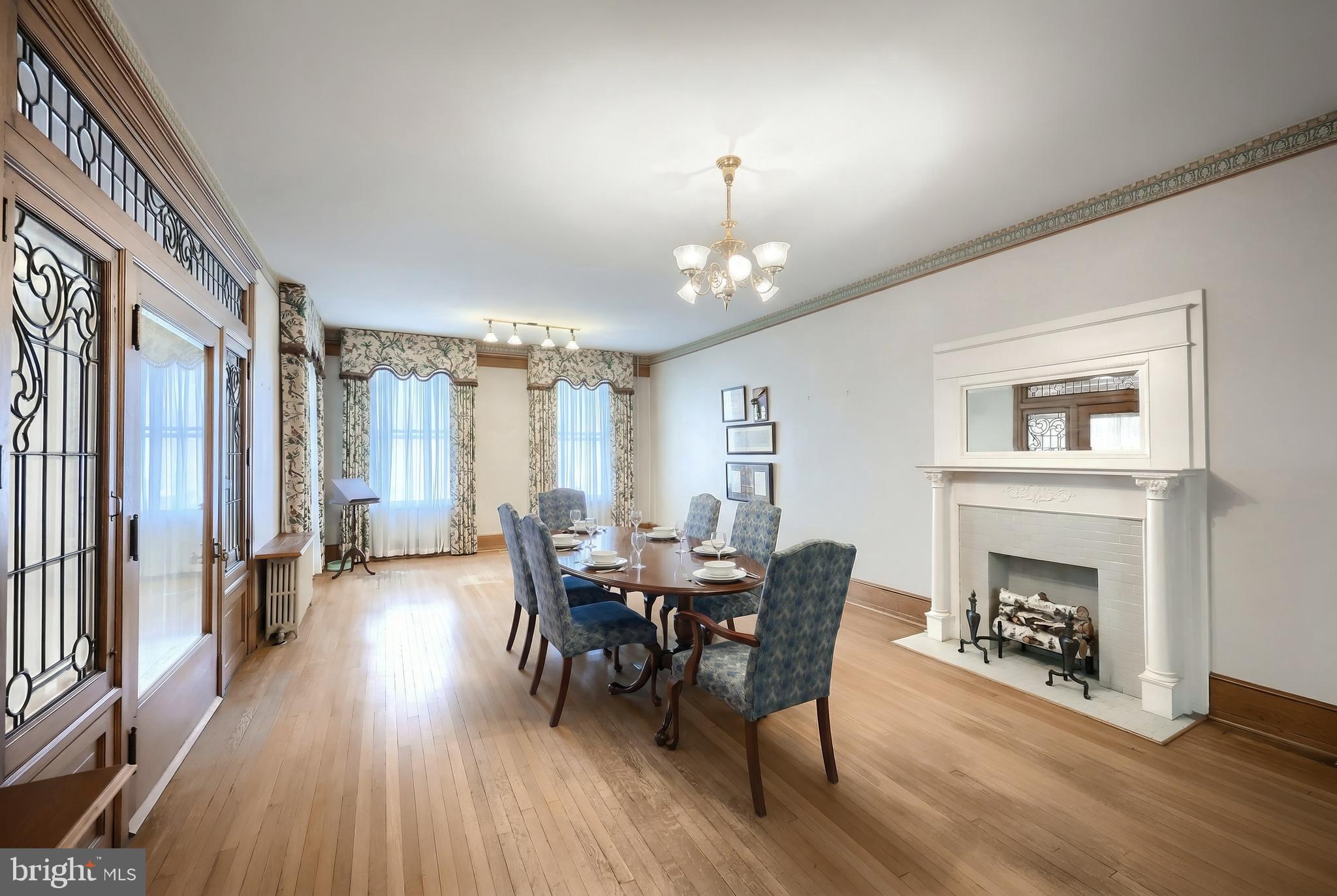 119 Baltimore Street Hanover, PA 17331 - Photo 8 of 26 a view of a dining room with furniture window and wooden floor