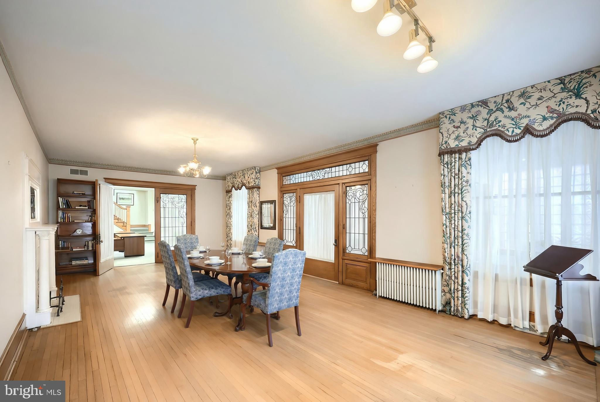 119 Baltimore Street Hanover, PA 17331 - Photo 9 of 26 a view of a dining room with furniture window and wooden floor
