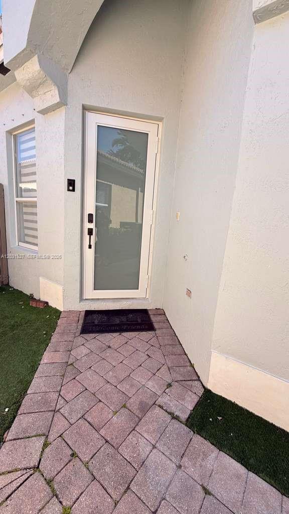 2120 Northeast 37th Road, Unit 1 Homestead, FL 33033 - Photo 12 of 30 a view of an entryway door