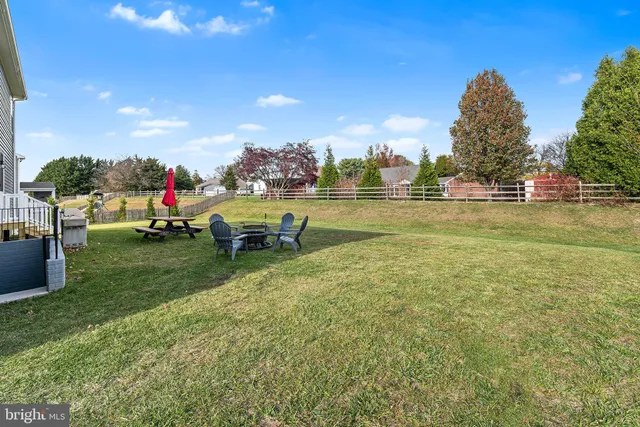 a childrens park with lots of swings and slides