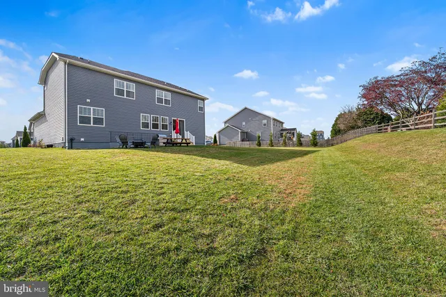 a view of a house with a big yard