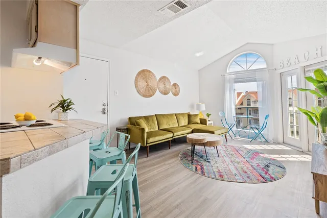 a view of kitchen with sink and stove