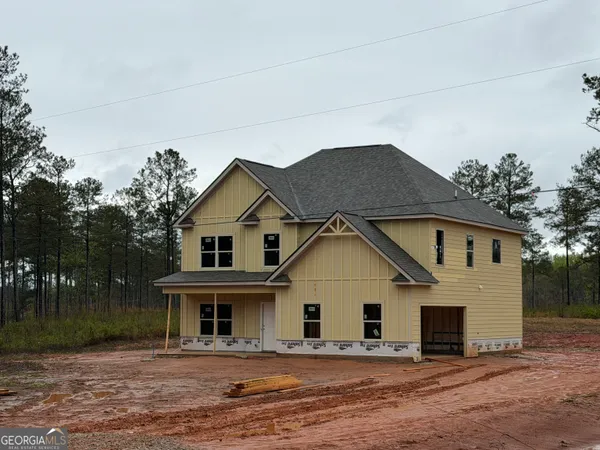 a front view of a house with a porch