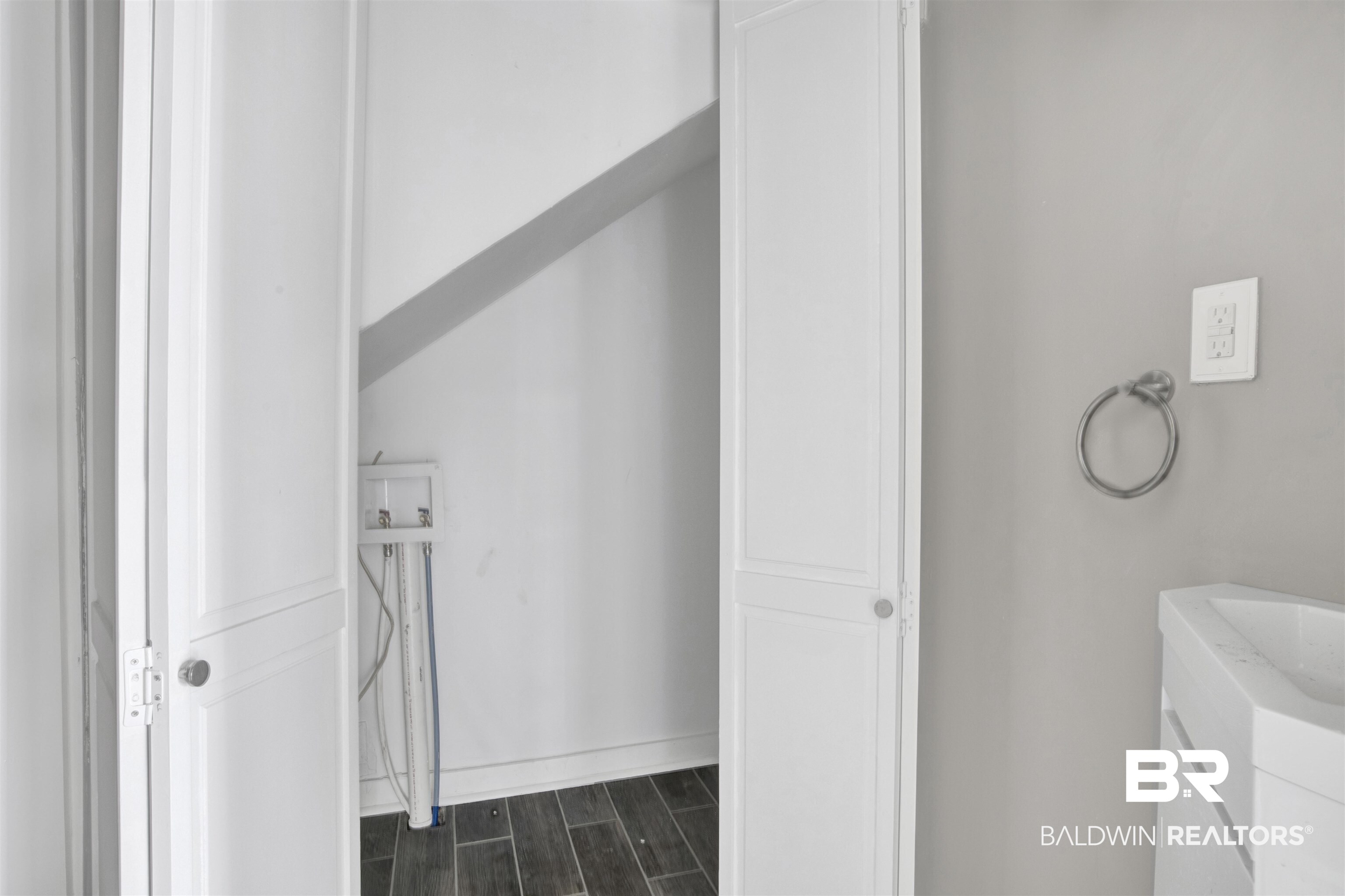 1063 Selma Street Mobile, AL 36604 - Photo 23 of 32 Bathroom featuring vanity and wood finish floors