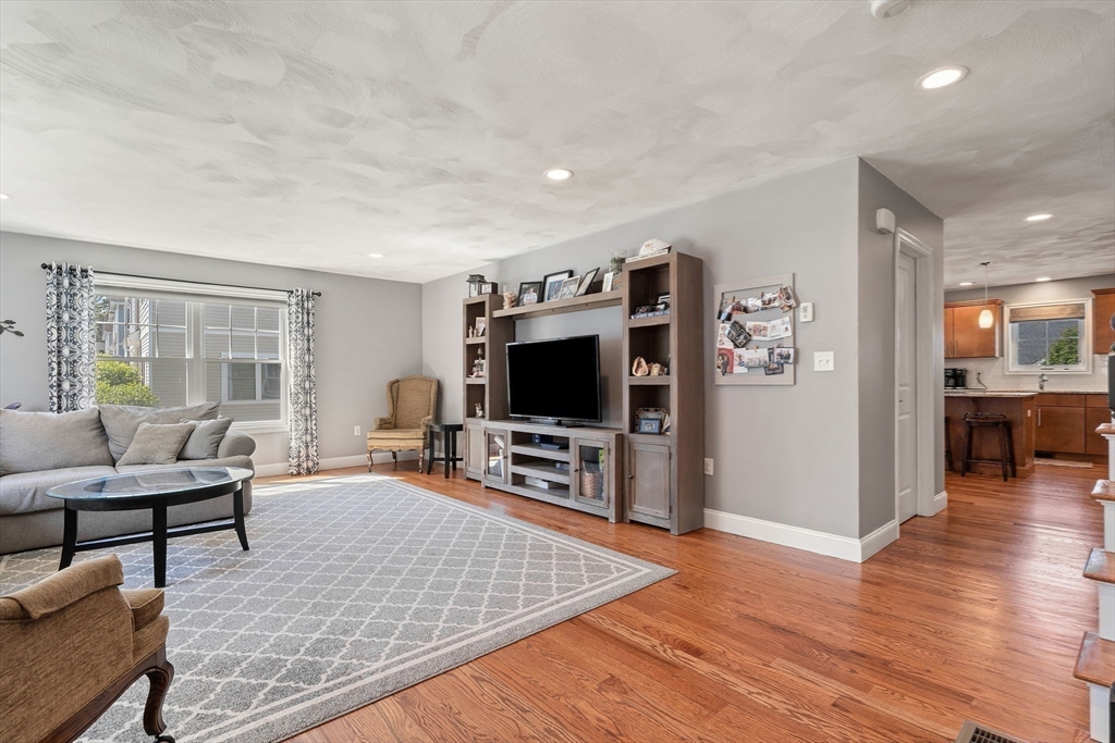 78 Oak Street, Unit 78 Clinton, MA 01510 - Photo 11 of 22 a living room with furniture and a flat screen tv