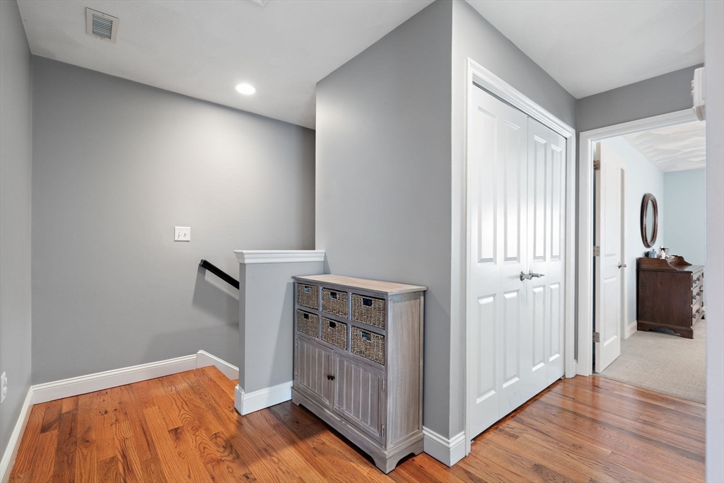 78 Oak Street, Unit 78 Clinton, MA 01510 - Photo 14 of 22 a view of a bedroom with wooden floor