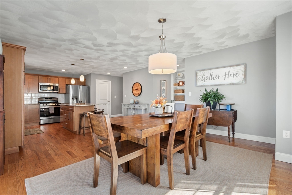 78 Oak Street, Unit 78 Clinton, MA 01510 - Photo 5 of 22 a view of a dining room and livingroom