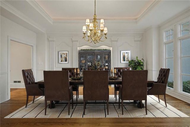 a kitchen that has a sink and a stove