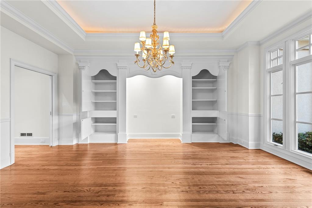 520 Chestnut Rose Lane Sandy Springs, GA 30327 - Photo 35 of 94 a view of empty room with wooden floor and window