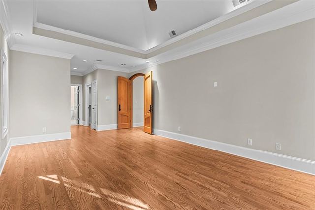 a view of an empty room with a fireplace