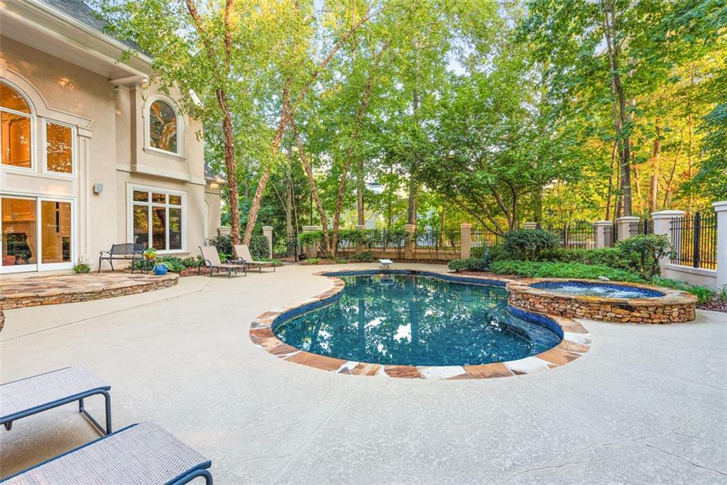 520 Chestnut Rose Lane Sandy Springs, GA 30327 - Photo 68 of 94 a view of outdoor space swimming pool and green space