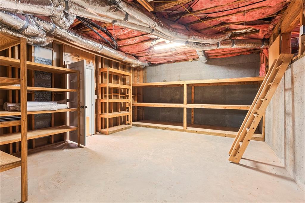 520 Chestnut Rose Lane Sandy Springs, GA 30327 - Photo 85 of 94 a view of an empty room with empty shelves