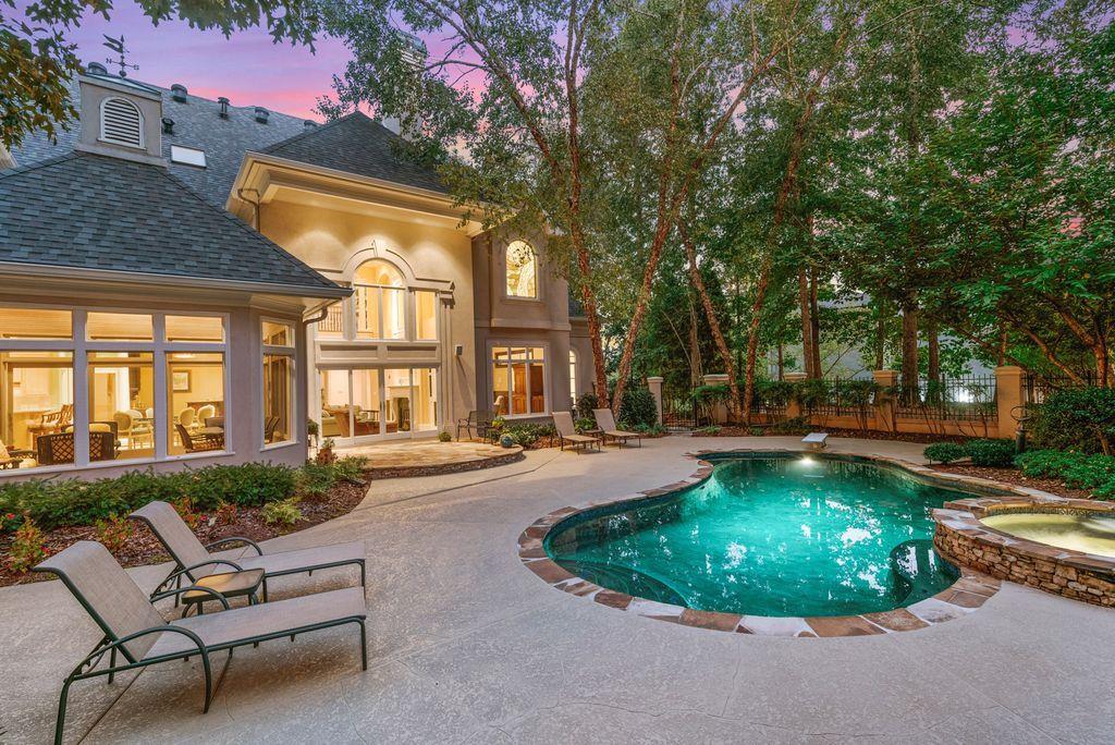 520 Chestnut Rose Lane Sandy Springs, GA 30327 - Photo 91 of 94 a view of a house with swimming pool and sitting area