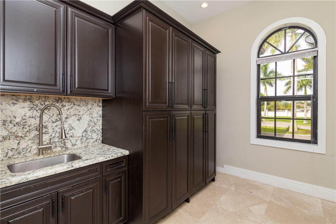5600 Southwest 136th Avenue Southwest Ranches, FL 33330 - Photo 22 of 32 a view of kitchen with wooden floor and window