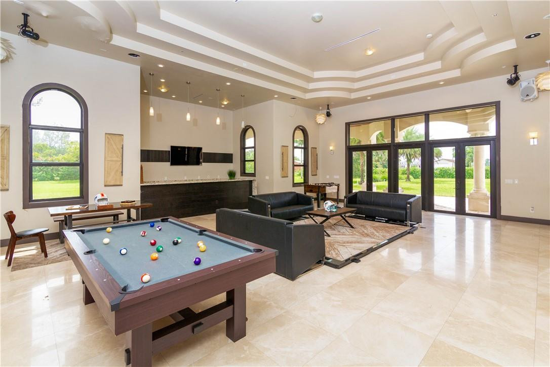 5600 Southwest 136th Avenue Southwest Ranches, FL 33330 - Photo 29 of 32 a living room with furniture pool table and a large window