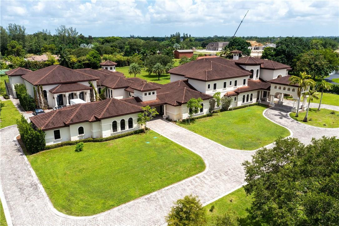 5600 Southwest 136th Avenue Southwest Ranches, FL 33330 - Photo 3 of 32 an aerial view of a house