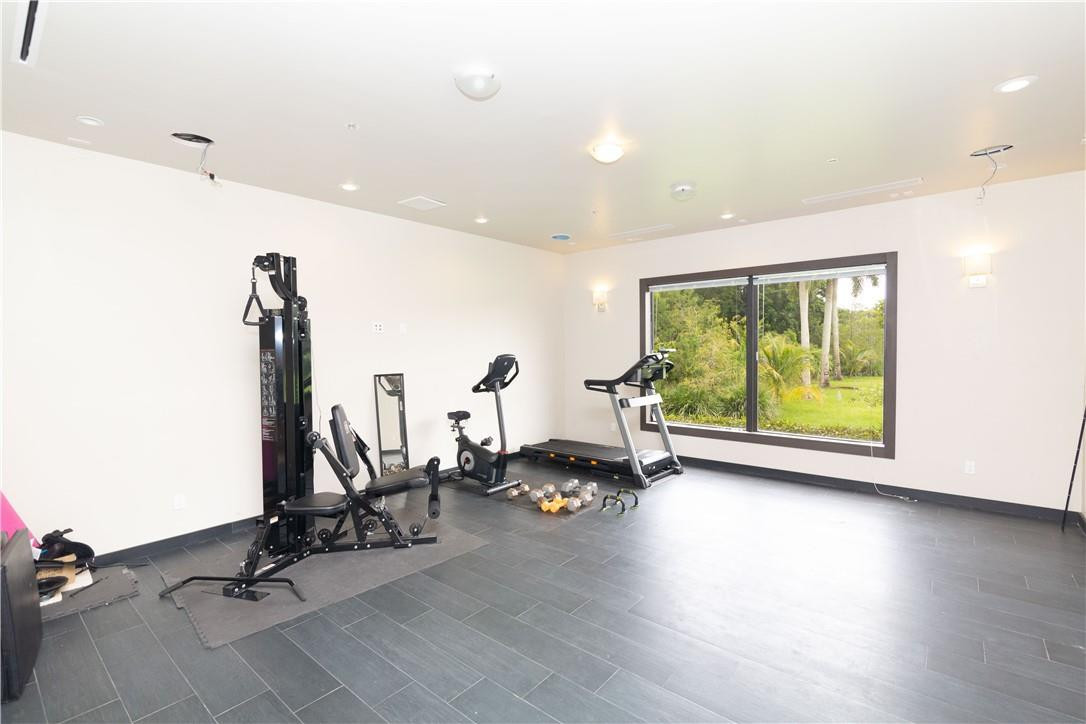 5600 Southwest 136th Avenue Southwest Ranches, FL 33330 - Photo 32 of 32 a view of a room with gym equipment