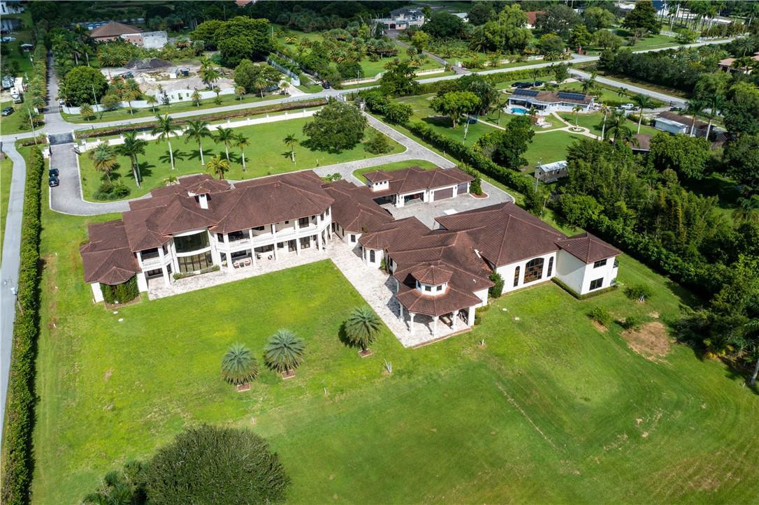 5600 Southwest 136th Avenue Southwest Ranches, FL 33330 - Photo 4 of 32 an aerial view of a house with yard swimming pool and outdoor seating