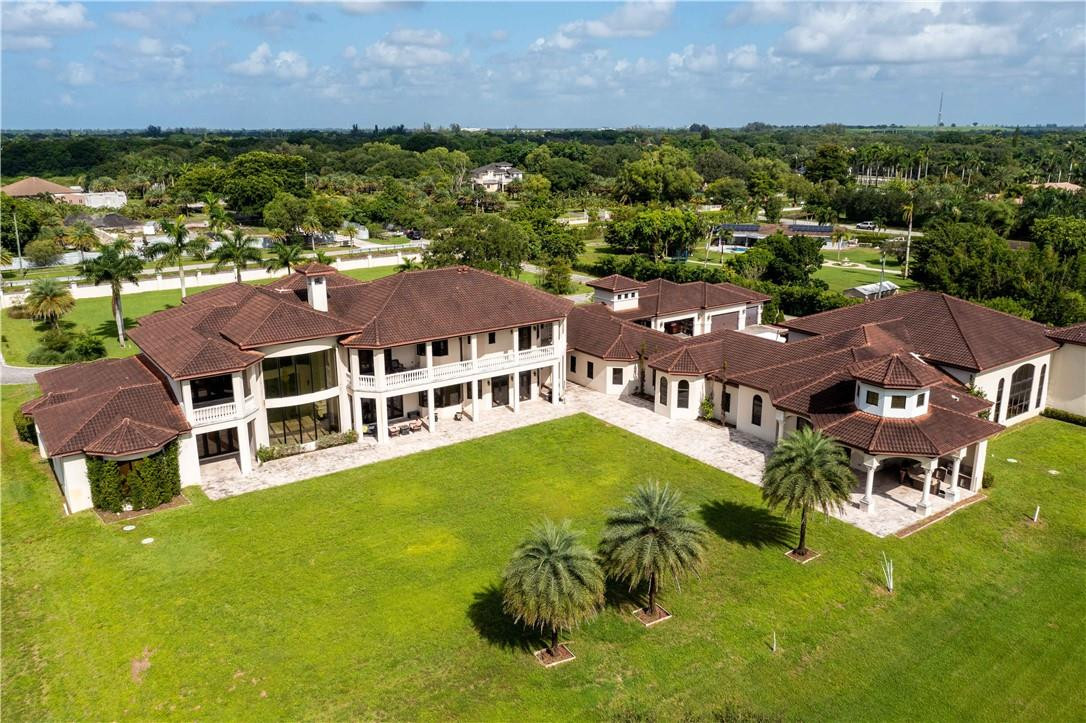 5600 Southwest 136th Avenue Southwest Ranches, FL 33330 - Photo 5 of 32 an aerial view of a house with a garden