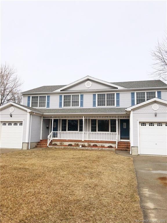 928 Oldfield Road Fairfield, CT 06824 - Photo 1 of 1 a front view of a house with a yard