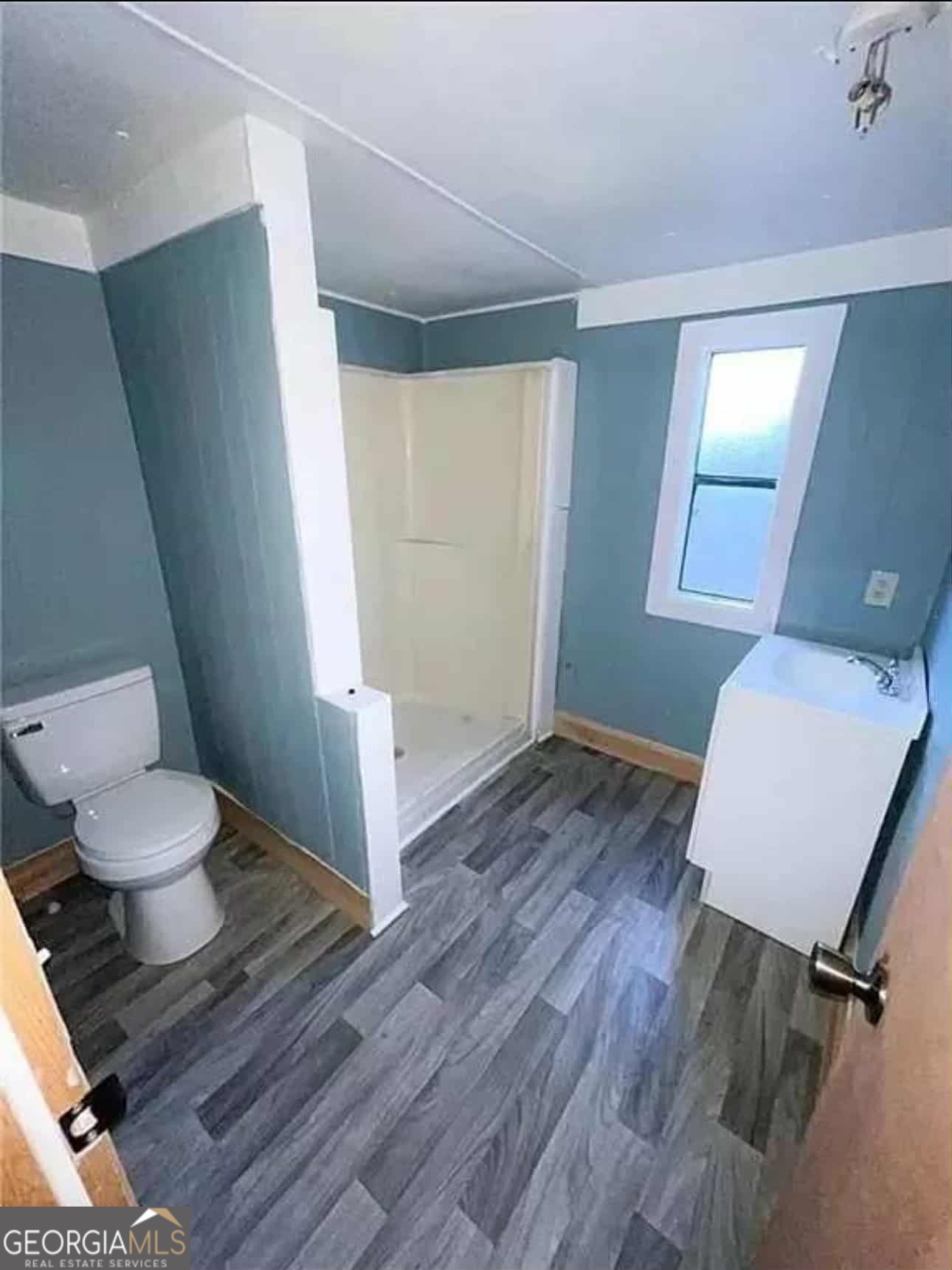 262 Blacks Bluff Road Southwest Rome, GA 30161 - Photo 14 of 16 a bathroom with a sink and a toilet