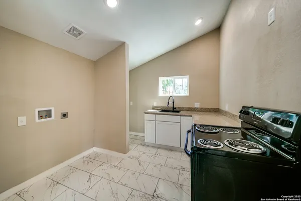 a living room with a fireplace