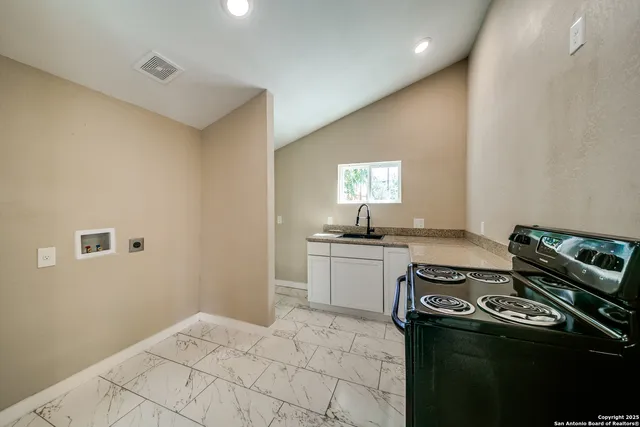 a living room with a fireplace