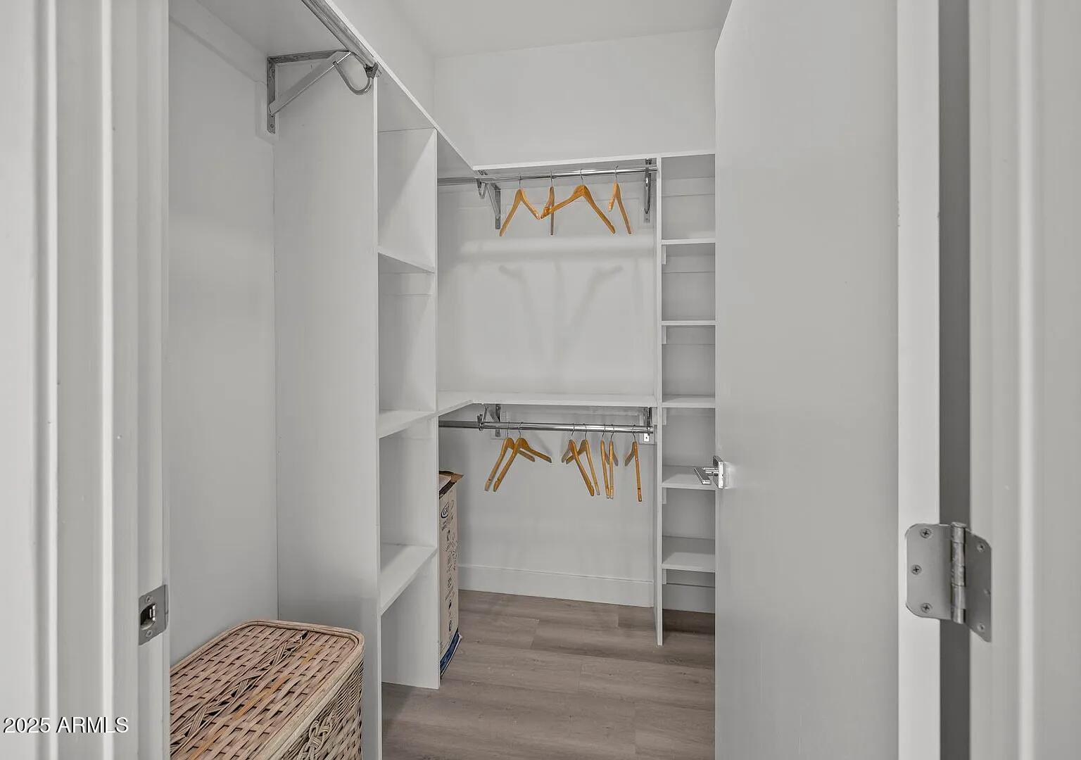 3130 North 37th Street, Unit 13 Phoenix, AZ 85018 - Photo 12 of 15 a view of walk in closet with empty racks