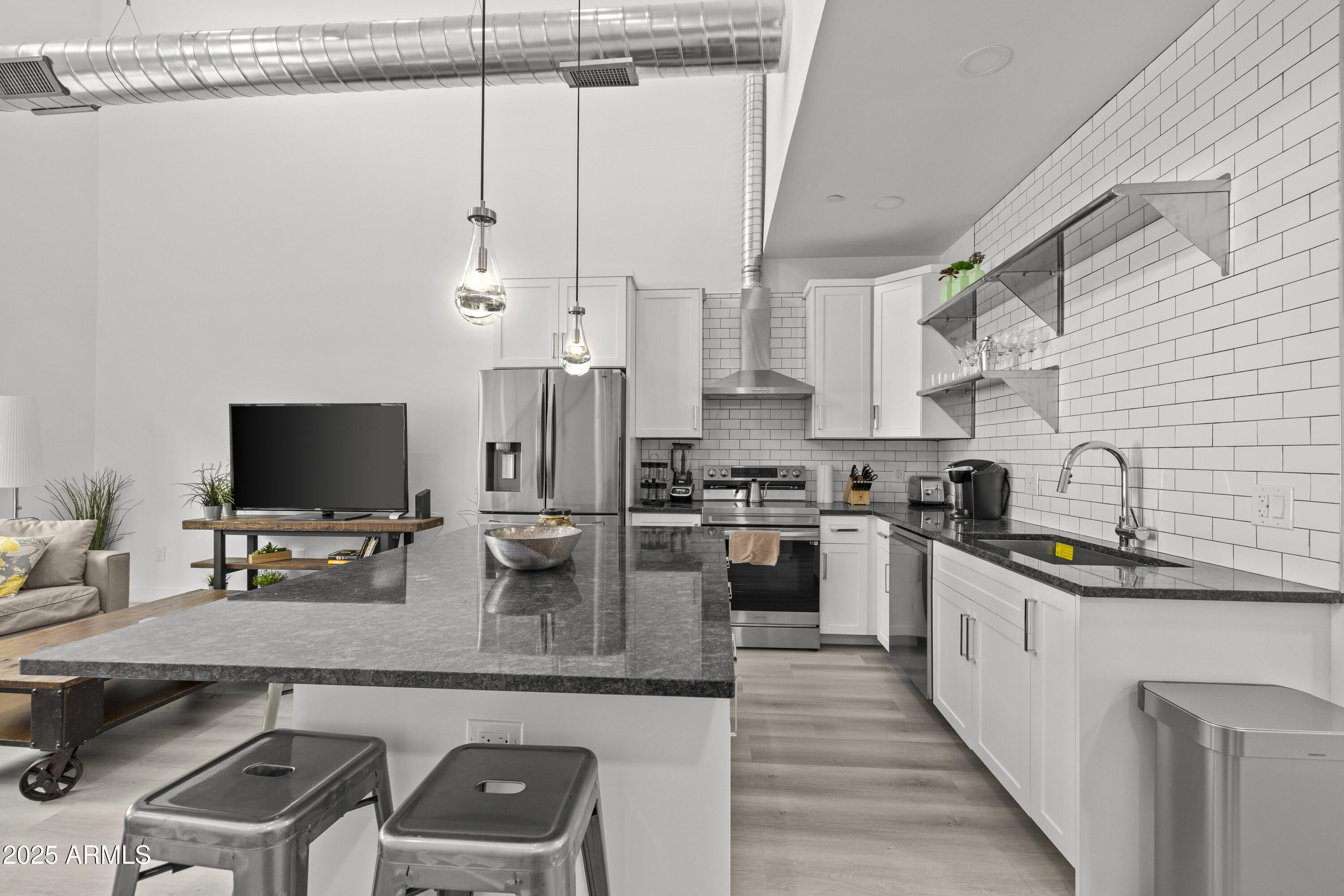 3130 North 37th Street, Unit 13 Phoenix, AZ 85018 - Photo 5 of 15 a kitchen with a sink appliances and cabinets
