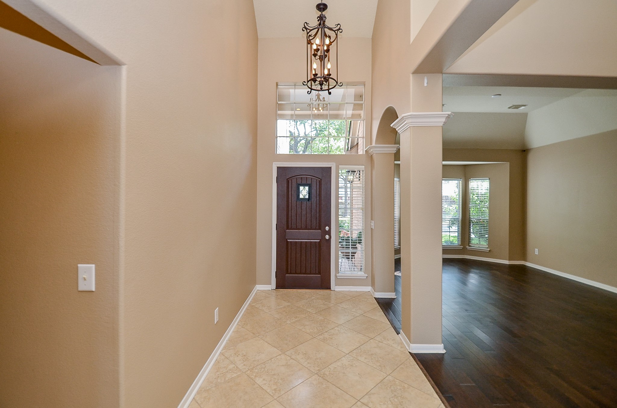 1222 Ragsdale Lane Katy, TX 77494 - Photo 3 of 31 Entryway is highlighted by a large transom & side lights, high ceilings and updated lighting.