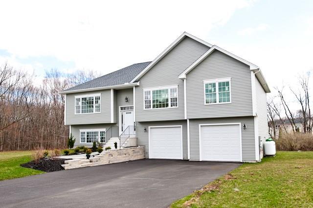 2318 Durham Road Madison, CT 06443 - Photo 1 of 1 The front is inviting with welcoming landscaping.